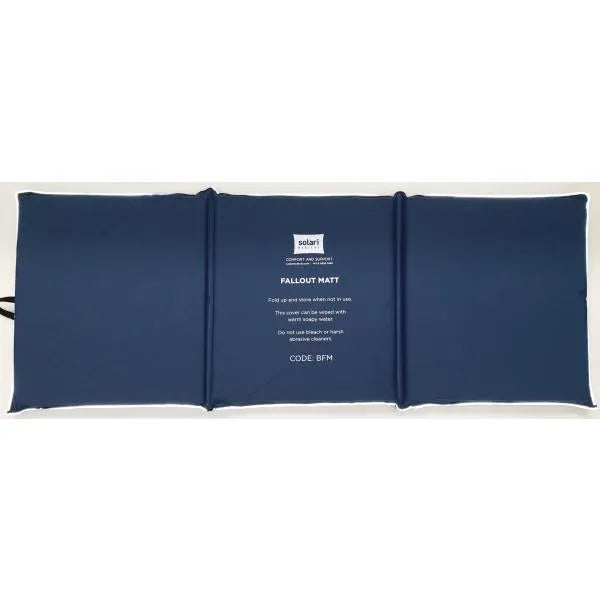 A navy blue inflatable emergency survival pad or fallout mat shown flat against a white background, with white printed text in the center and a small logo at the top.