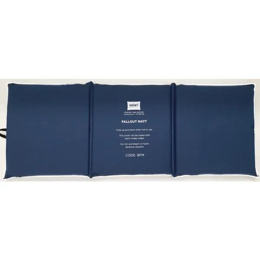 A navy blue inflatable emergency survival pad or fallout mat shown flat against a white background, with white printed text in the center and a small logo at the top.