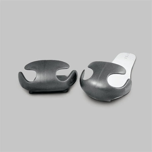 Grey ergonomic foot orthotics for mobility support and recovery, shown with adhesive backing