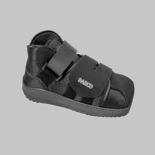 Black Darco post-op recovery shoe with velcro straps for foot rehabilitation and mobility support