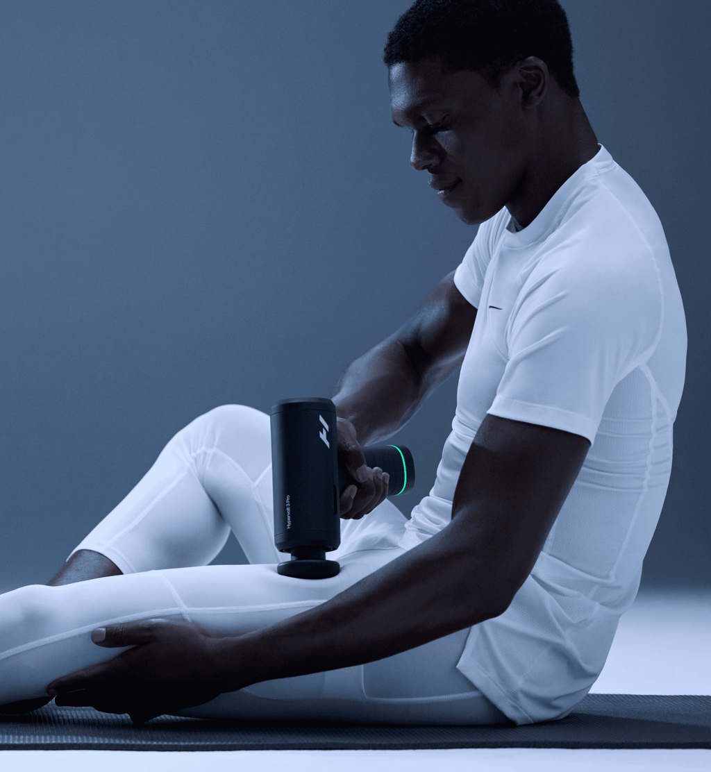 Hypervolt 3 Pro in use on leg muscle
