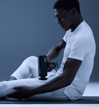 Hypervolt 3 Pro in use on leg muscle