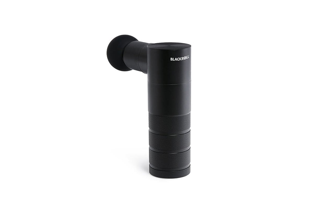 BLACKROLL Fascia Massage Gun in use