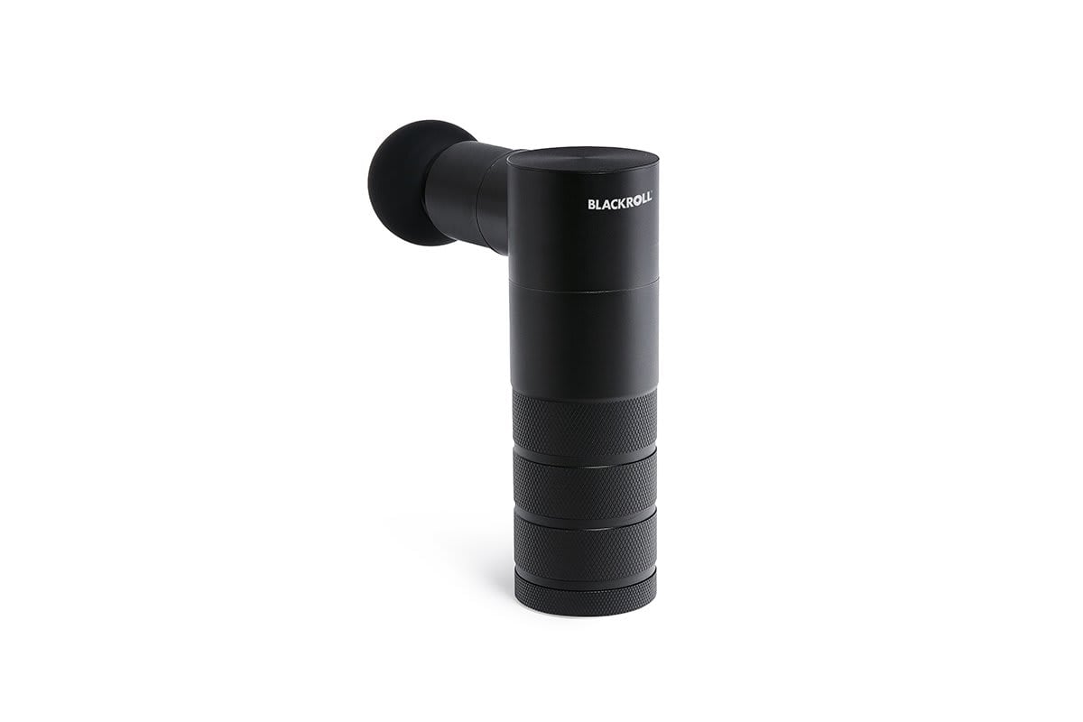 BLACKROLL Fascia Massage Gun in use